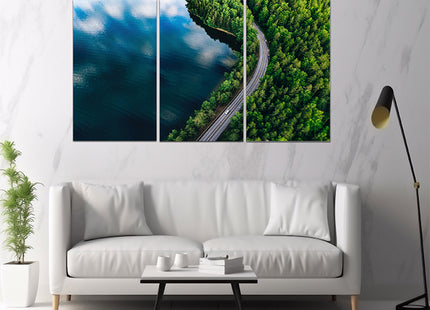 Aerial view of blue lake in Finland green forest and Road AOA13009 {x3}