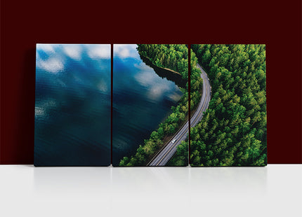 Aerial view of blue lake in Finland green forest and Road AOA13009 {x3}