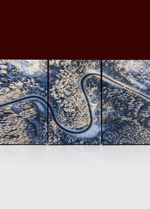 Winter chill Aerial view of road and forest in snow AOA13019 {x3}